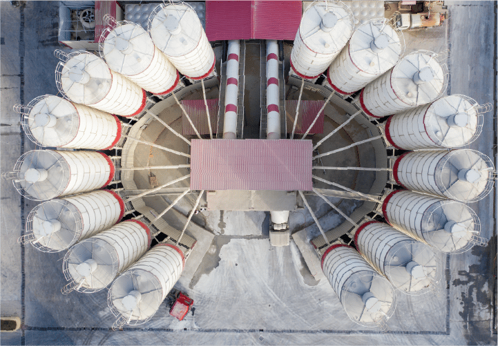 Exterior campus of a U.S. complex containing storage tanks and process units for heavy-industry operations